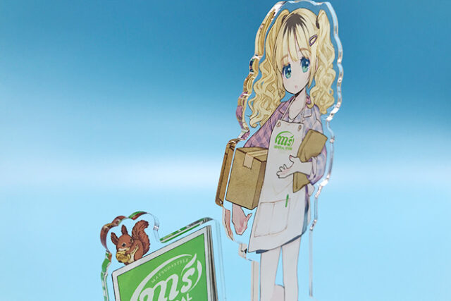 ツインテールの女の子が看板の前に立つアクリルスタンド