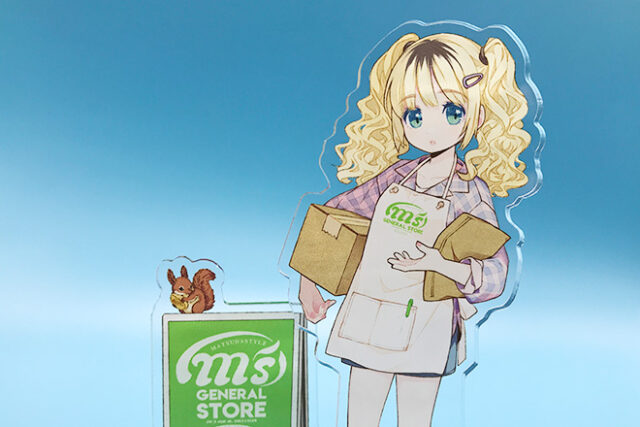 ツインテールの女の子が看板の前に立つアクリルスタンド
