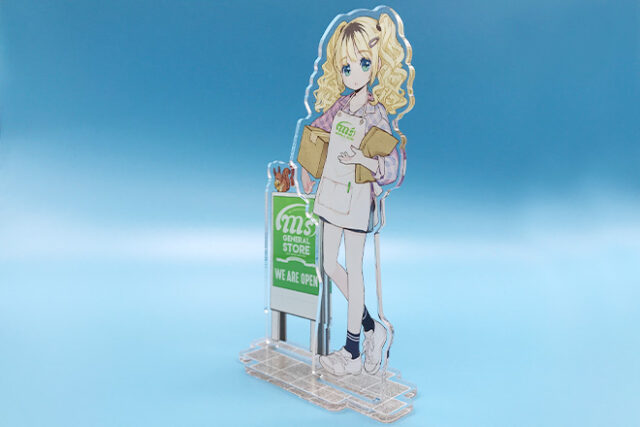 ツインテールの女の子が看板の前に立つアクリルスタンド