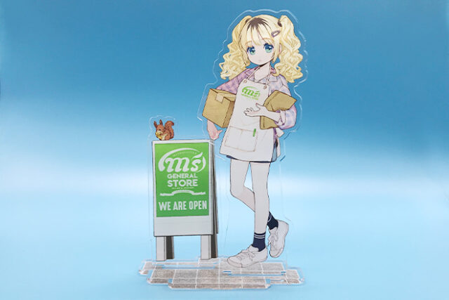 ツインテールの女の子が看板の前に立つアクリルスタンド